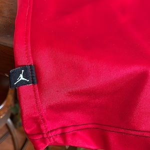 Jordan size XL basketball shorts with red detail